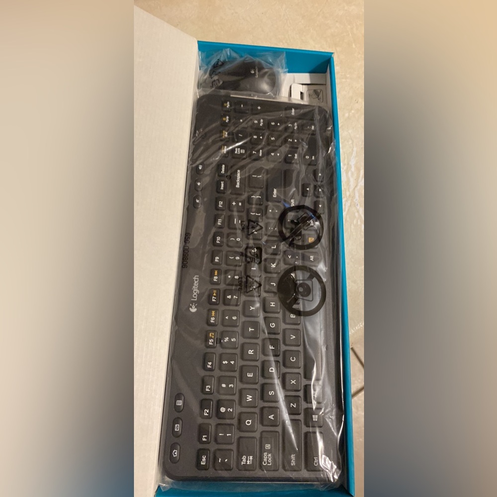 Logitech keyboard and mouse bundle (brand new) never been used